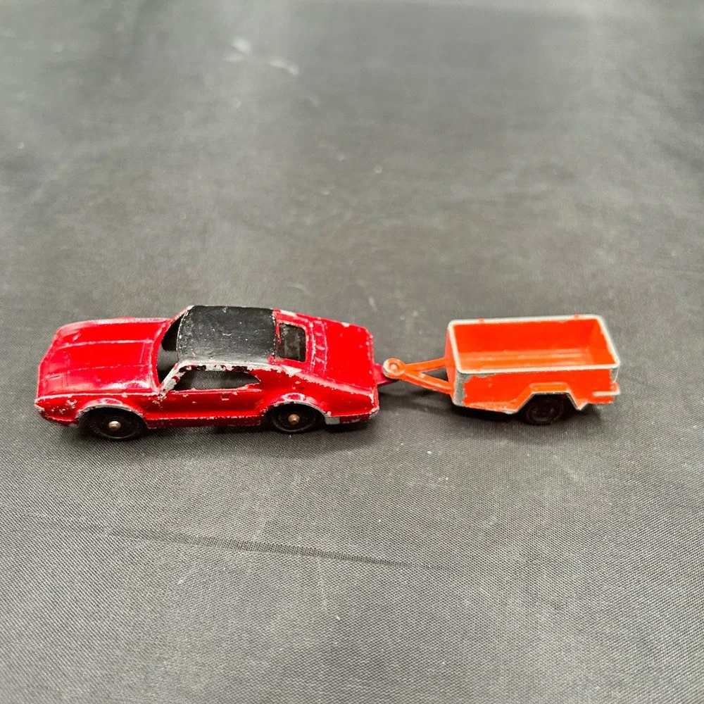 Vintage Tootsietoy Red Oldsmobile Toronado Diecast Car with UHaul Trailer USA